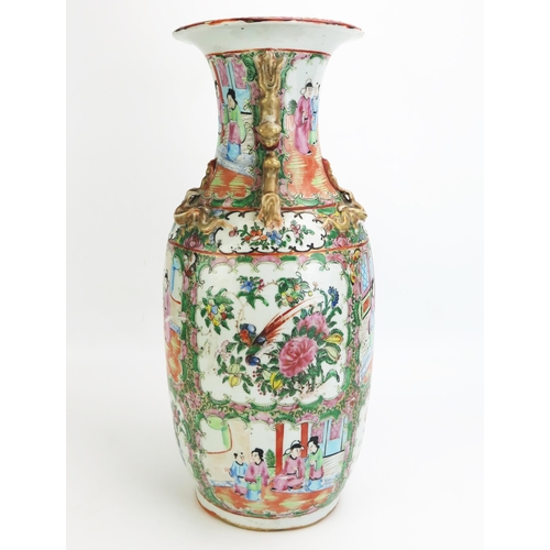 1161 - A large late 19th century Cantonese porcelain export ware vase painted coloured enamels of panels de... 