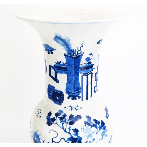 1162 - A large Chinese blue and white yenyen vase, with trumpet-shaped neck and baluster body decorated wit... 