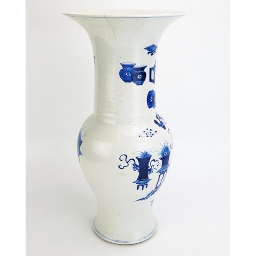 1162 - A large Chinese blue and white yenyen vase, with trumpet-shaped neck and baluster body decorated wit... 