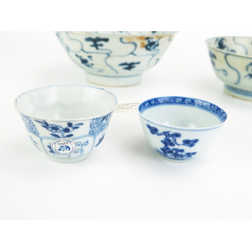 1168 - Two Tek Sing cargo blue and white bowls, both bearing Nagel Tek Sing labels, 12.5cm and 15.5 cm diam... 