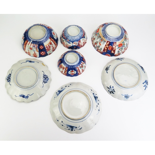 1180 - Four assorted Imari porcelain bowls of lobed form, 18cm and 13.5cm diameter, together with three pla... 