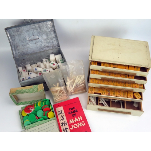 1190 - A Mahjong set contained in a fitted case, together with another Mahjong set. (2).