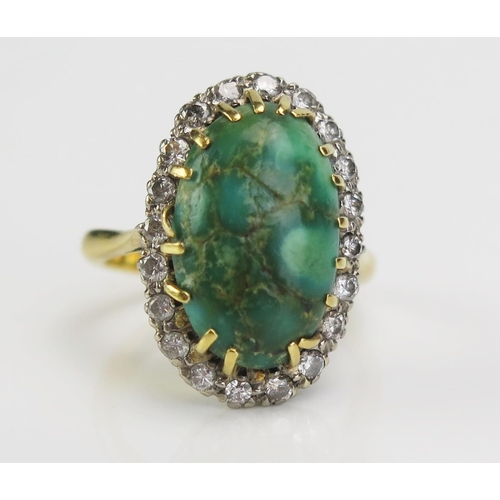 121 - An 18ct Gold, Diamond and Turquoise Oval Cluster Ring, 22x15mm head, c. 2mm diamonds, size M.5, c. 8... 