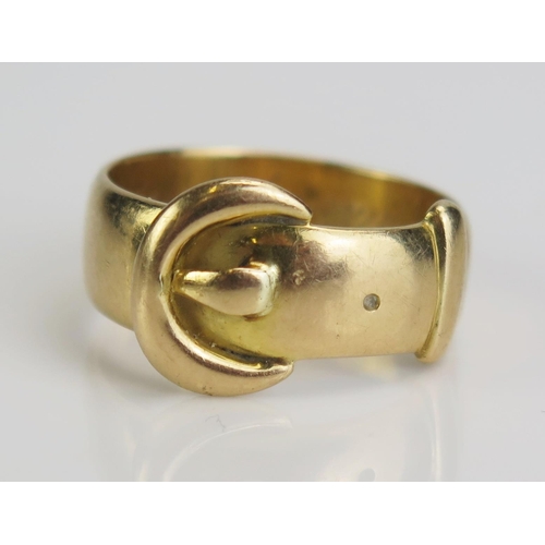 122 - An Antique 18ct Gold Buckle Ring engraved 