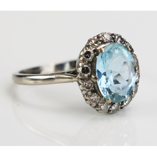 125 - An 18ct White Gold and Platinum, Aqua Marine and Diamond Cluster Ring, 14x13mm head, size R.5, c. 4.... 