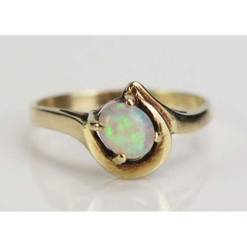 126 - A 9ct Gold and Singlet Opal Ring, size N, c. 1.95g