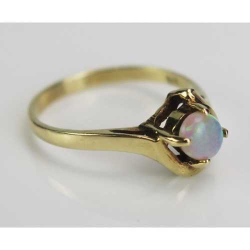 126 - A 9ct Gold and Singlet Opal Ring, size N, c. 1.95g