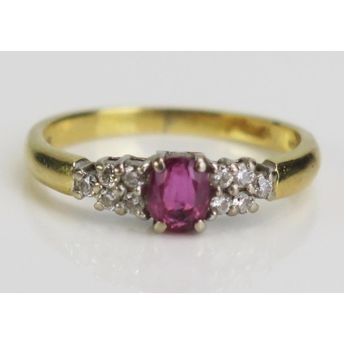 128 - An 18ct Gold, Ruby and Diamond Ring, c. 4.8x3.8mm principal stone, size K.5, c. 2.54g