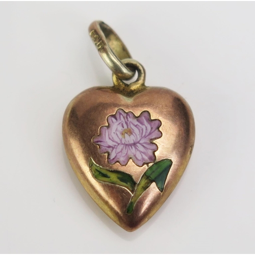 129 - A 9ct Gold Heart Shaped Pendant decorated in enamels with a flower, 22mm drop, c. .9g