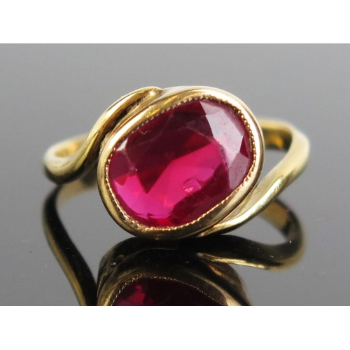 138 - An 18ct Gold and Red Sapphire? Ring, c. 10x8mm stone, size O, c. 3.98g