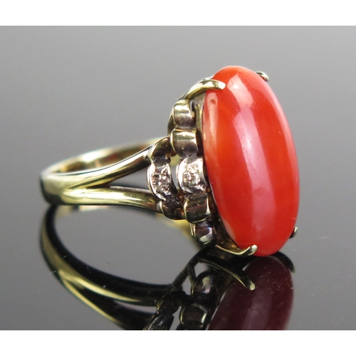 146 - A 14K Gold, Coral and Diamond Dress Ring, 17.5x10.5mm coral, size J.5, c. 6.22g