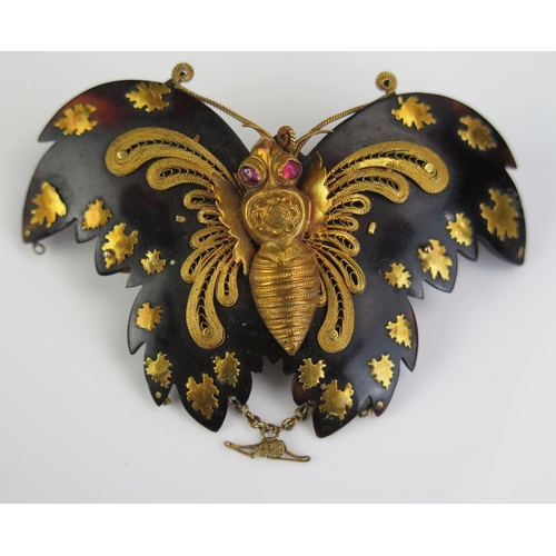 152 - A Large Georgian Tortoise Shell and Gold  Butterfly Brooch with cabochon ruby eyes, 59mm wingspan, c... 