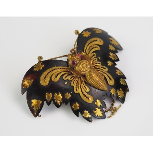 152 - A Large Georgian Tortoise Shell and Gold  Butterfly Brooch with cabochon ruby eyes, 59mm wingspan, c... 