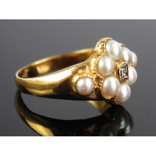 154 - An untested Pearl and Diamond Ring in an unmarked precious yellow metal setting, 16x12mm head, KEE t... 