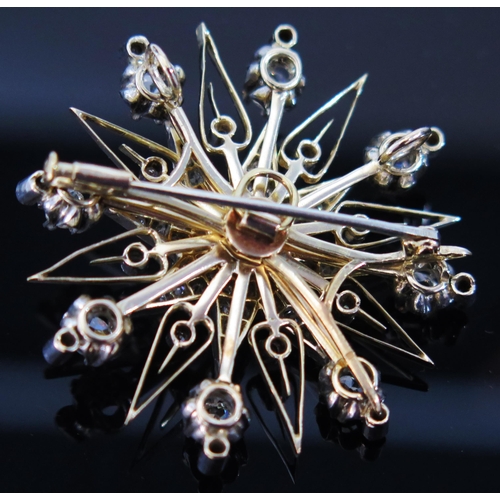 165 - A Diamond Star Brooch with pendant mount in an unmarked precious yellow and white metal setting, old... 