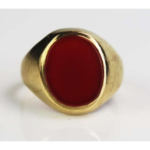 173 - A 9ct Good Signet Ring set with carnelian, hallmarked, size I.25, c. 2.73g