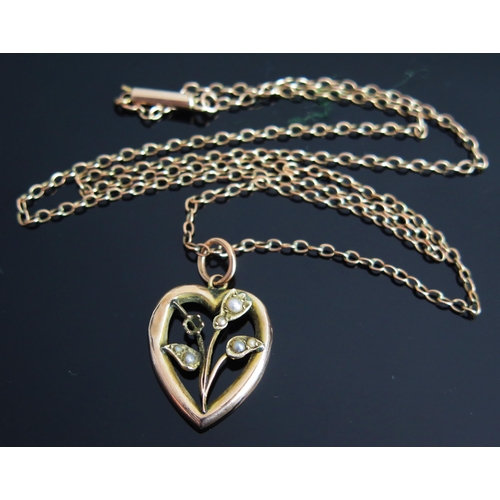 270 - A 9ct Gold and untested Pearl Heart Shaped Pendant on a 9ct gold chain with barrel clasp (18