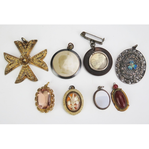 300 - Eight Pendants including a gilt filigree Maltese Cross