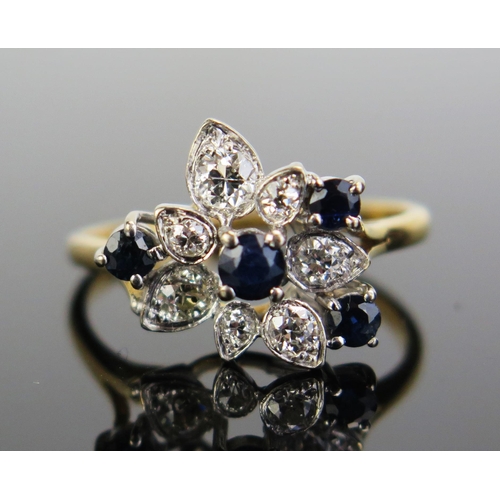 323 - An 18ct Gold, Sapphire and Diamond Dress Ring, c. 35mm largest diamond, size U.5, c. 4.46g