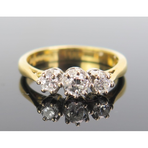 328 - An 18ct Gold and Diamond Three Stone Ring, c. 39mm principal stone, size J.5, c. 3.35g