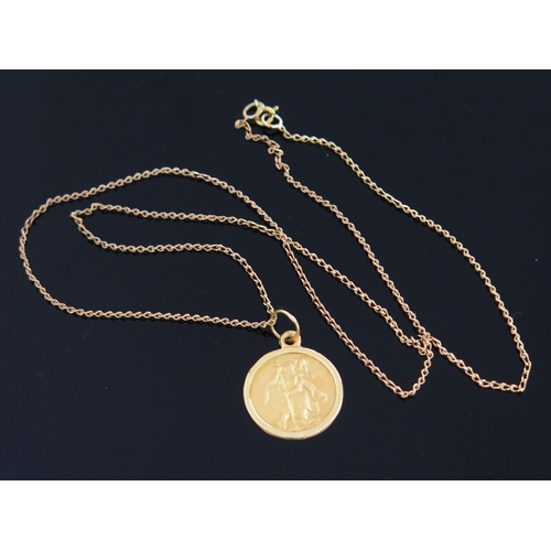 330 - An 18ct Gold St. Christopher Pendant on a handmade chain (20.25