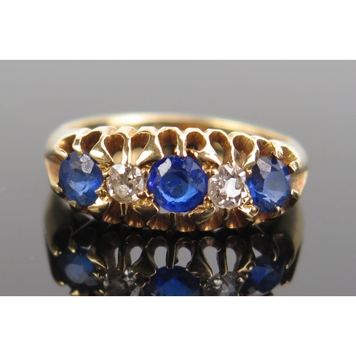 335 - An 18ct Gold, Diamond and Blue Stone Ring, sizeJ.5, c. 3.21g