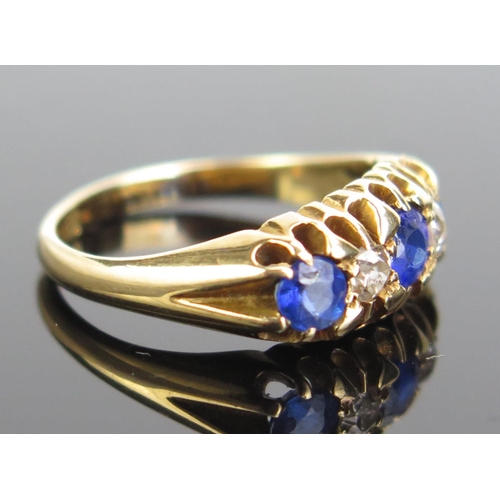 335 - An 18ct Gold, Diamond and Blue Stone Ring, sizeJ.5, c. 3.21g