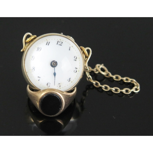 336 - A 9ct Gold and Onyx Signet Ring (size Q.75, c. 4.89g) and a silver gilt mounted Ball watch (A/F)