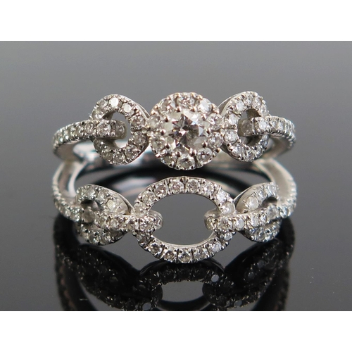 338 - An 18ct White Gold and Diamond Split Shank Ring, .89ct, size L.5, c. 4.51g. Presented in a Cartier b... 