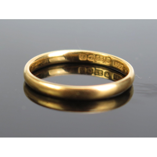 345 - A 22ct Gold Plain Wedding Band, c. 2.3mm wide, size M.25, Birmingham 1929, c. 2.33g