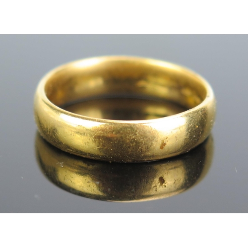 349 - An Antique 22ct Gold Gent's Plain Wedding Band, c. 5.2mm wide, size T.5, indistinct Birmingham marks... 