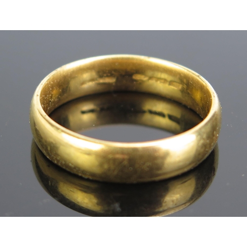 349 - An Antique 22ct Gold Gent's Plain Wedding Band, c. 5.2mm wide, size T.5, indistinct Birmingham marks... 