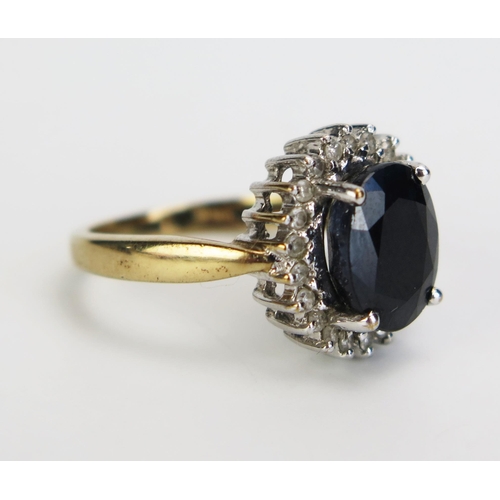 351 - A 9ct Gold, Sapphire and Diamond Cluster Ring, 14x13mm head, size L.5, c. 4.22g