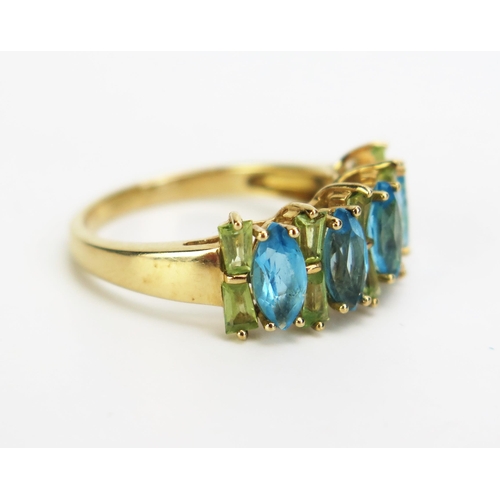 355 - A 9ct Gold, Blue and Yellow Stone Dress Ring, 19x8.5mmhead, size M.5, c. 3.38g