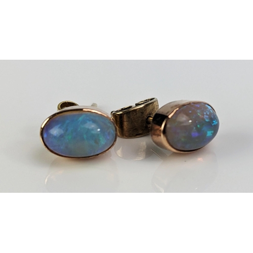 4 - A Pair of Opal Stud Earrings in an unmarked precious yellow metal setting, 9x5mm stones, 1.83g