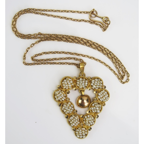 63 - An Iranian 18ct Gold and untested Seed Pearl Pendant (43mm drop, 7g) on an unmarked 19