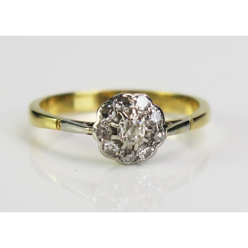 70 - An 18ct Gold and Old Cut Diamond Cluster Ring, size R.5, 3.6g