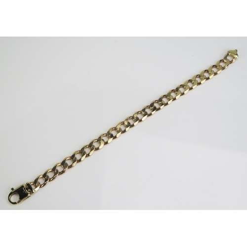 72 - A Gent's Heavy 9ct Gold Curb Link Bracelet, 11mm wide, 9.5