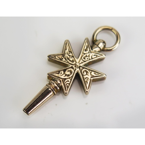 82 - A Victorian Precious Yellow Metal Maltese Cross Watch Key with chased foliate decoration, c. 1.79g