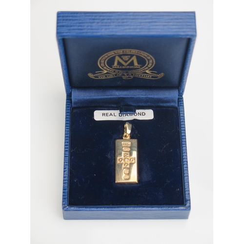 86 - A 9ct Gold Millennium Pendant Ingot set with a single diamond (boxed, limited edition 1/4oz stated b... 