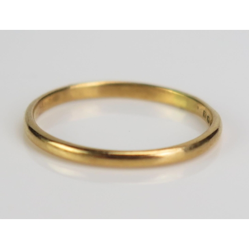 94 - A 22ct Gold Wedding Band, Birmingham 1951, 18mm wide, size L.25, c. 1.38g