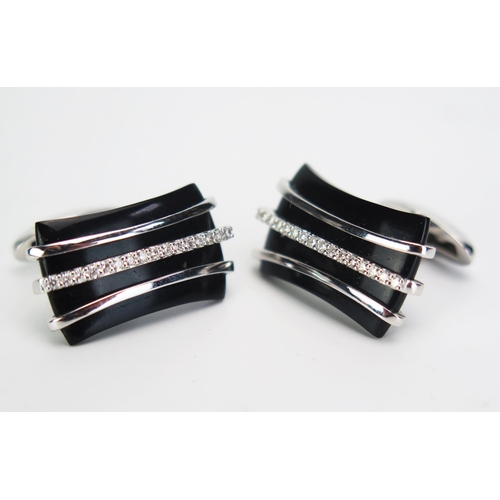 137 - A Pair of 18ct White Gold, Diamond and Onyx Cufflinks, 22x12.5mm head, c. 9.23g