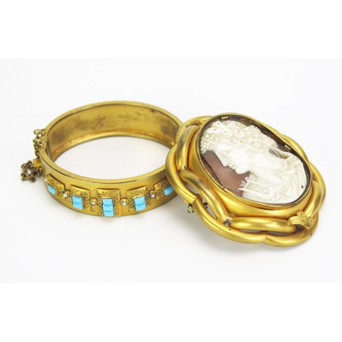 277 - A Victorian Gilt Metal Turquoise Glass and untested Pearl Hinged Bangle and a Victorian Pinchbeck sw... 