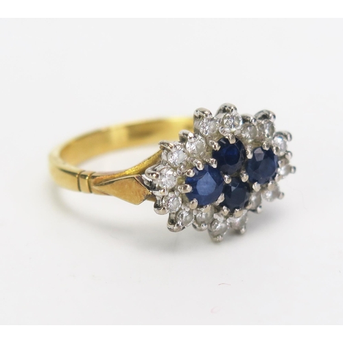 329 - An 18ct Gold, Sapphire and Diamond Three Stone Ring, c. 14.8x12mm head, size M, c. 4.87g