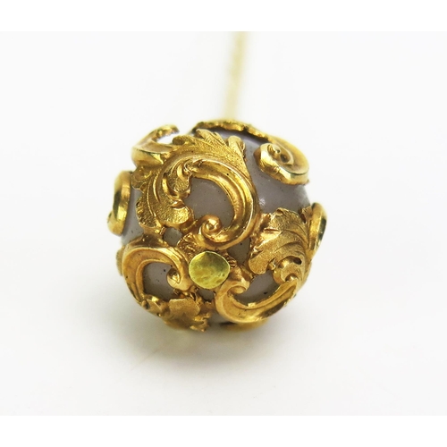 332 - A 19th Century Stick Pin decorated with acanthus leaf in yellow metal, KEE tested as 18ct, c. 82mm, ... 