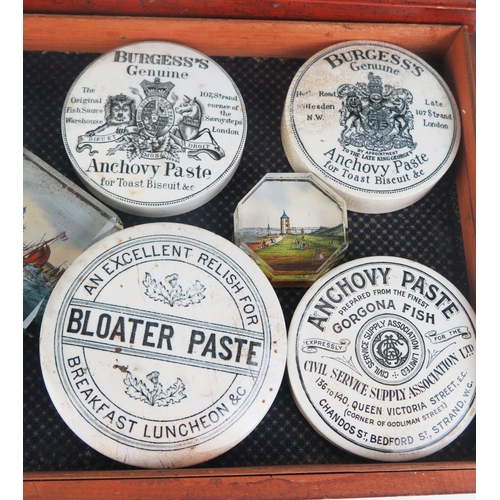 1002 - A collection of assorted pot lid covers including 'Bloater paste', 'Anchovy Paste', 'Cheery Tooth Pa... 