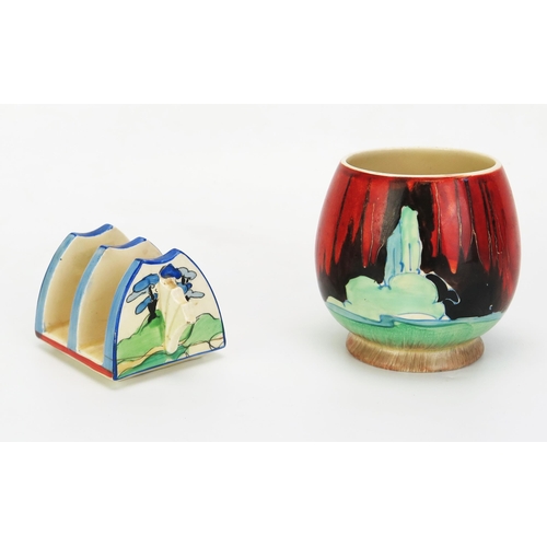 1003 - A Clarice Cliff 'Forest Glen' daffodil preserve pot, a country cottage set in a tonal red streaked d... 