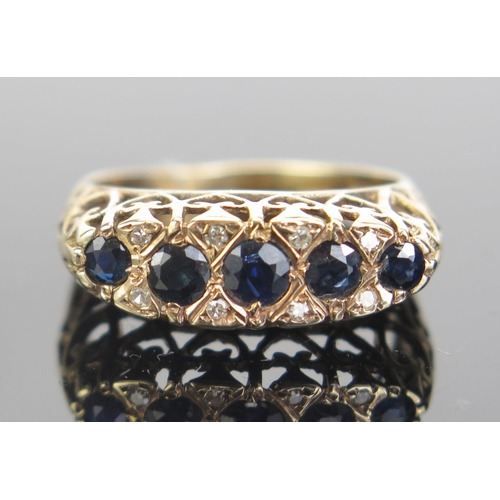 102 - A 9ct Gold, Sapphire and Diamond Ring, 21x7.5mm head, hallmarked, size R.5, 3.42g