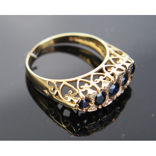 102 - A 9ct Gold, Sapphire and Diamond Ring, 21x7.5mm head, hallmarked, size R.5, 3.42g