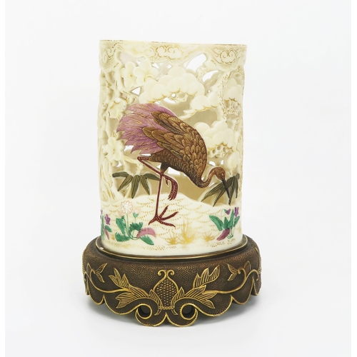 1025 - A rare Royal Worcester porcelain tusk vase in the Japanese taste, with pierced ivory ground having p... 